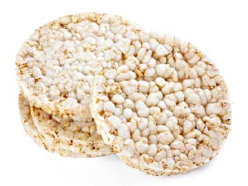 Healthy Puffed Rice Cakes Crackers Stacked With Sea Salt Stock Photo -  Download Image Now - iStock