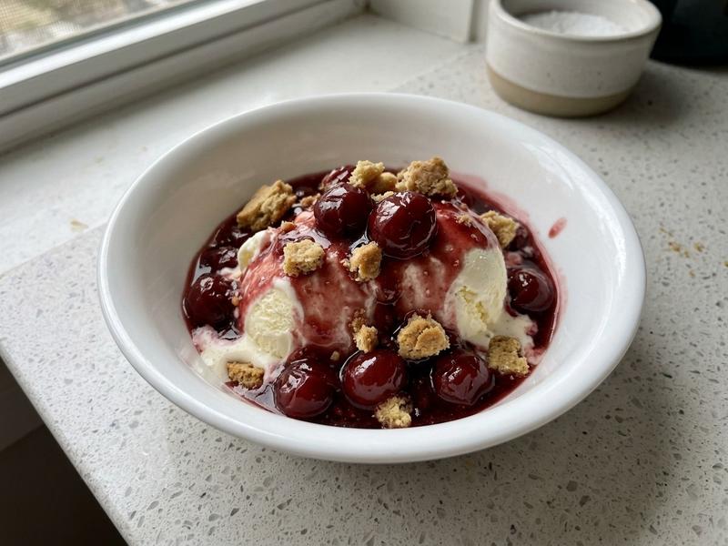 Warm Skillet Sour Cherries with Vanilla Ice Cream