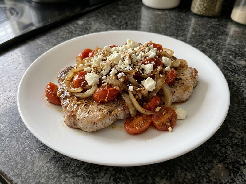Pork Chops with Tomato, Onion, Garlic, and Feta