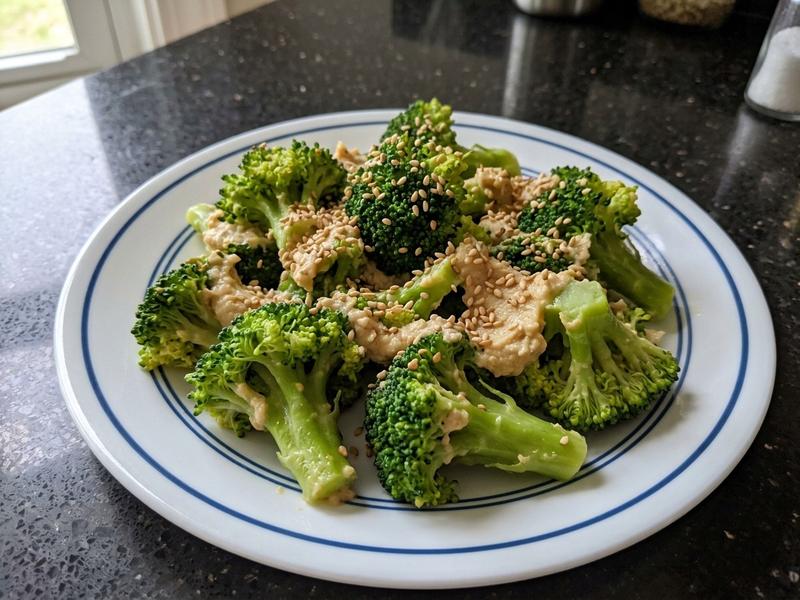 Broccoli with Hummus & Sesame Seeds